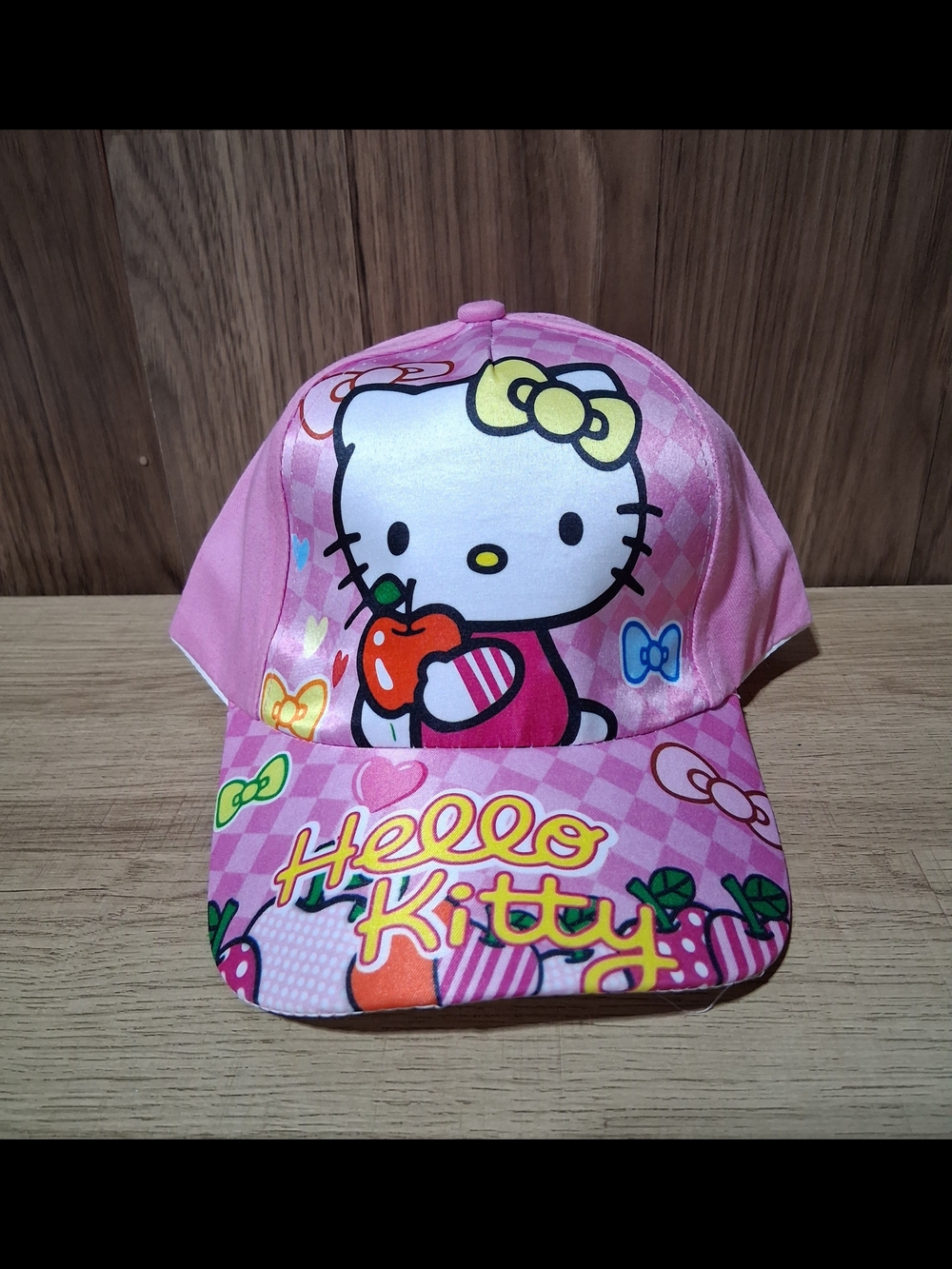 Hello Kitty Pink Cap with Yellow Bow and Multicolor Accents